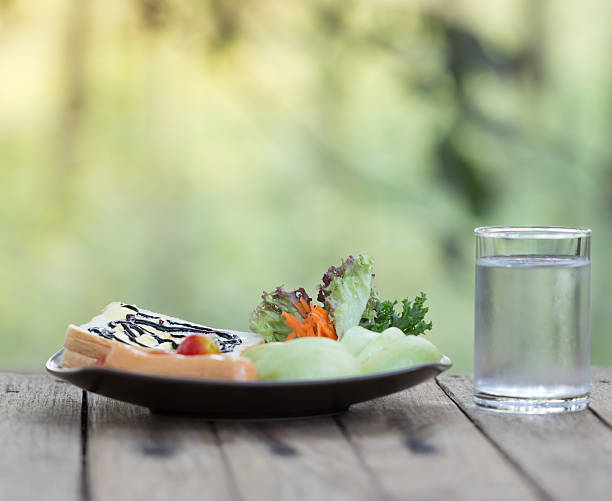 Balanced meal with water representing mindful hydration lifestyle